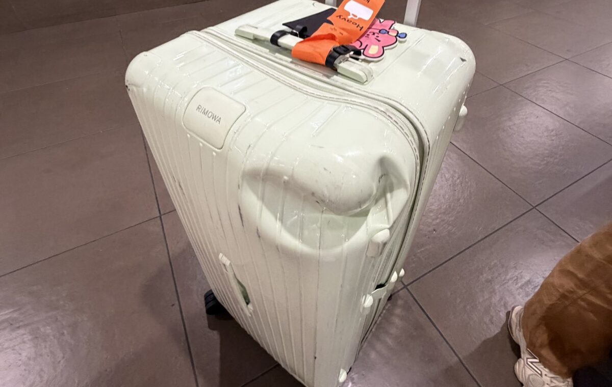 The corner was crushed, the structure deformed, and the damage looked exactly like the kind of abuse checked luggage experiences every day.
